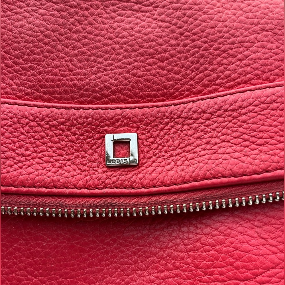 Crossbody fold over purse, salmon/coral color